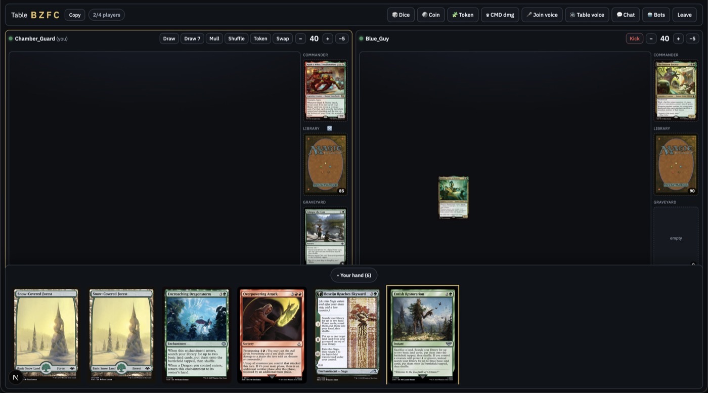 Playtable with hand open showing lands and spells while the opponent board stays visible